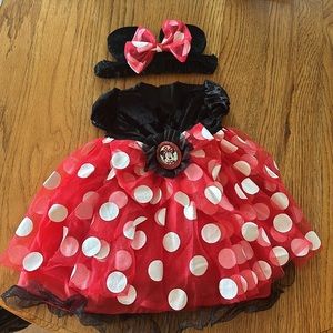 Disney Mini Mouse infant dress with matching ears and bow headband.

01-43